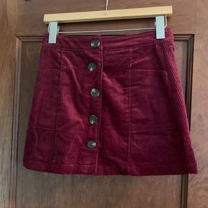 Red corduroy mini skirt